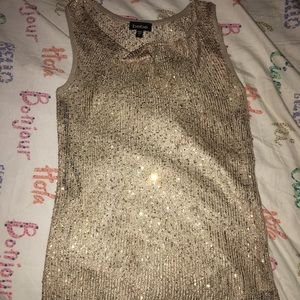 A gold shimmering Bebe small